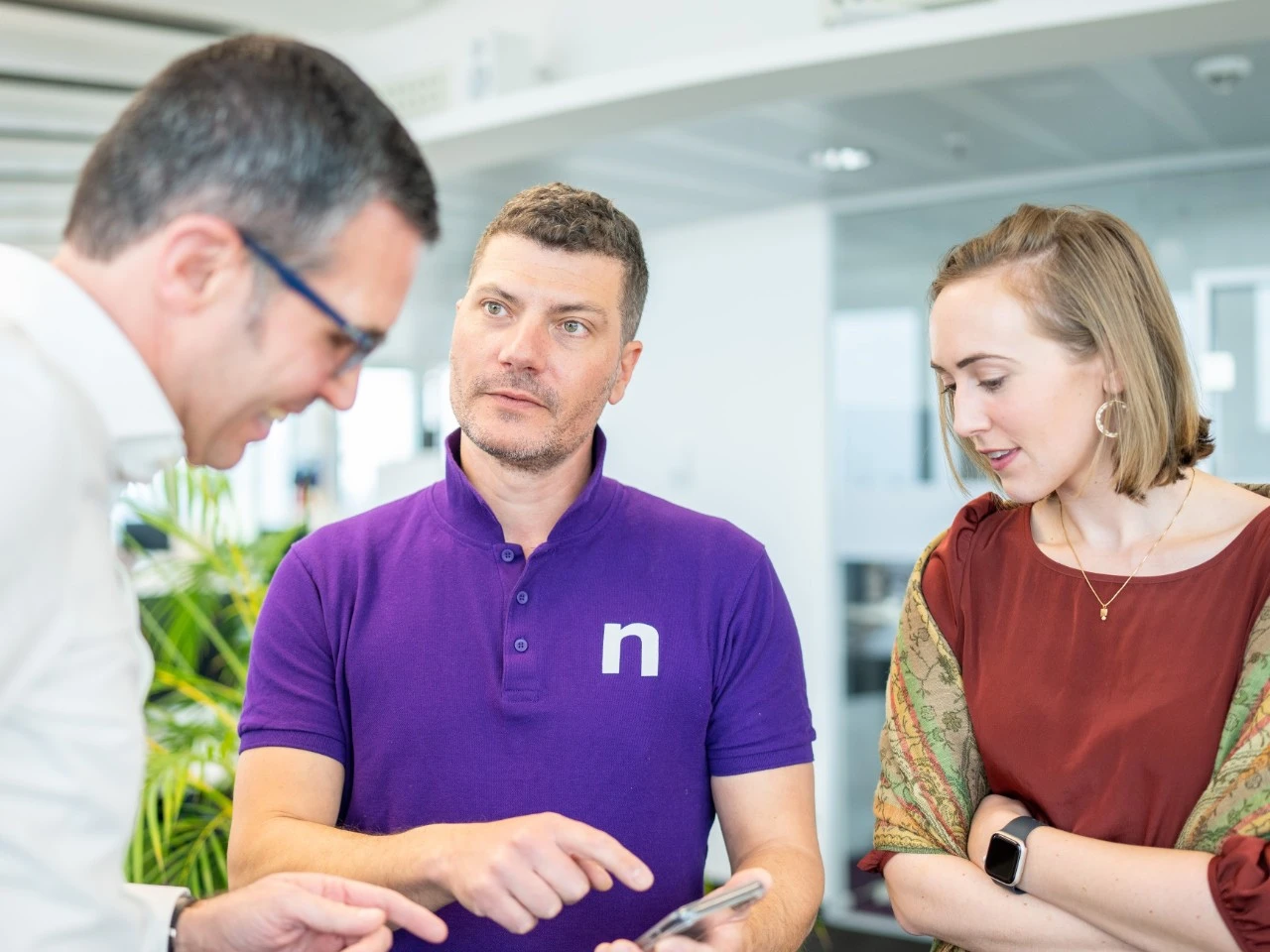 Colleagues talking in one of our Studios